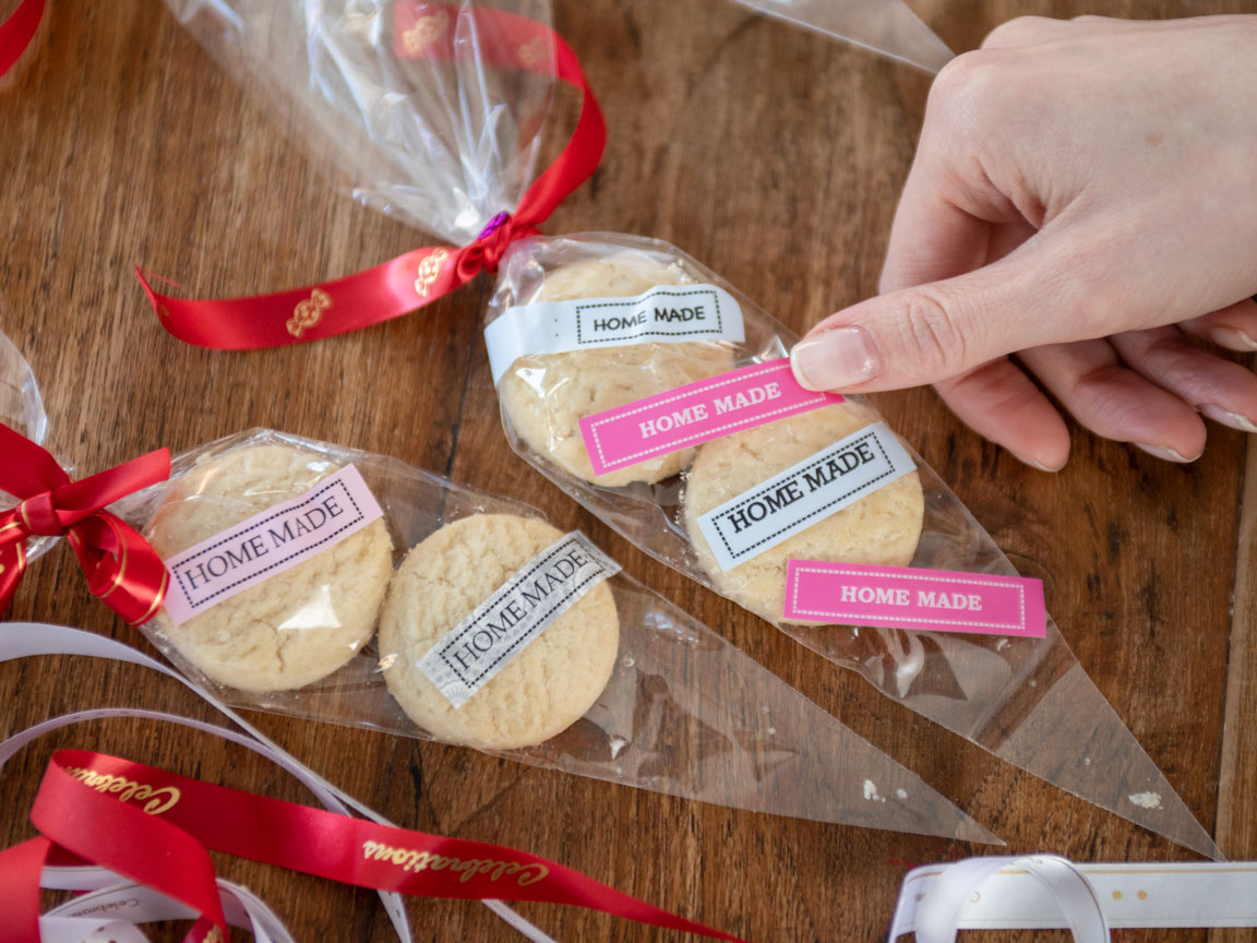 Brother P-touch labels and ribbons being used to create a craft prject/gifts